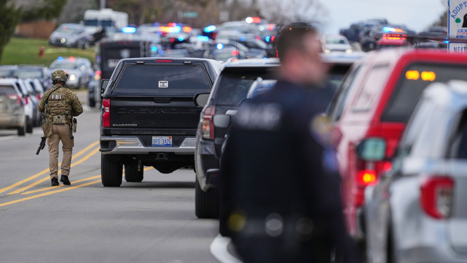 Gunman who drove car at US synagogue full of children is shot dead