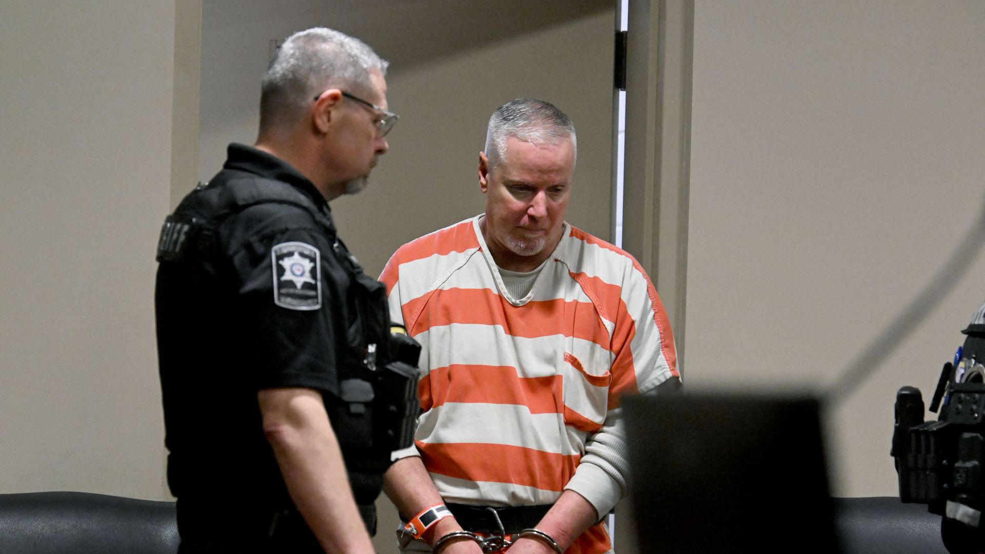 Father who gifted gun to son before he carried out deadly high school shooting jailed for 15 years
